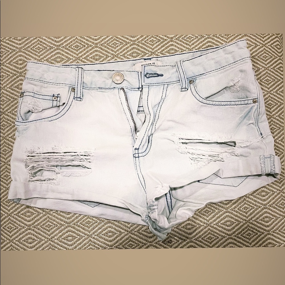Distressed denim shorts